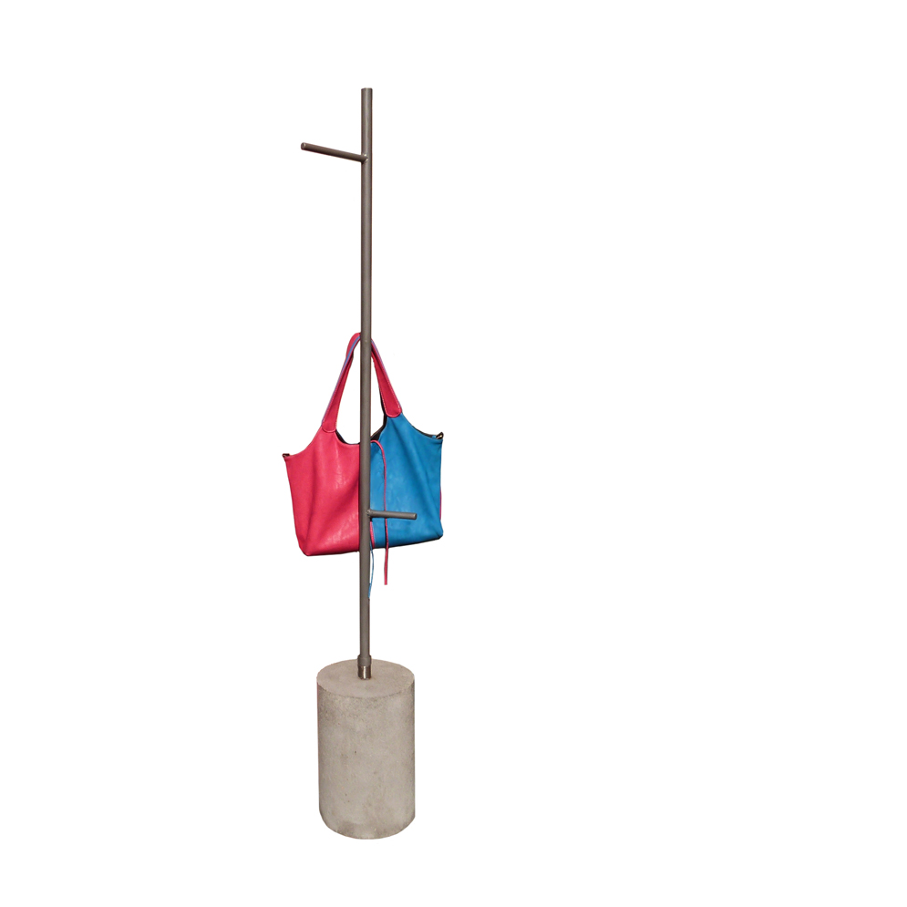 iron coatrack with concrete stand and colored handbag